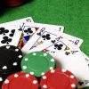 royal flush of shamrocks between betting chips